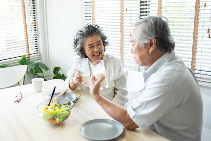 An older couple enjoys a healthy meal together